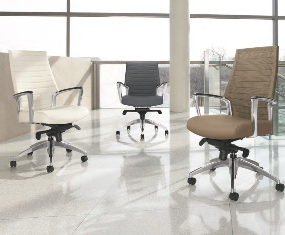 Global Accord Chairs - Three Global Accord chairs in a sunny office with high windows. A white upholstered high back and meshback Accord chair faces eachother. Further back is a black mid-back model of Accord chair.