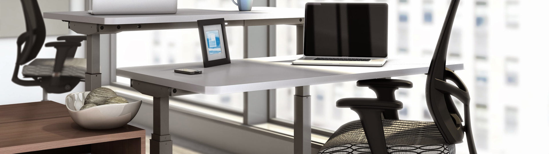 sit-stand height adjustable ergonomic desks by Mayline