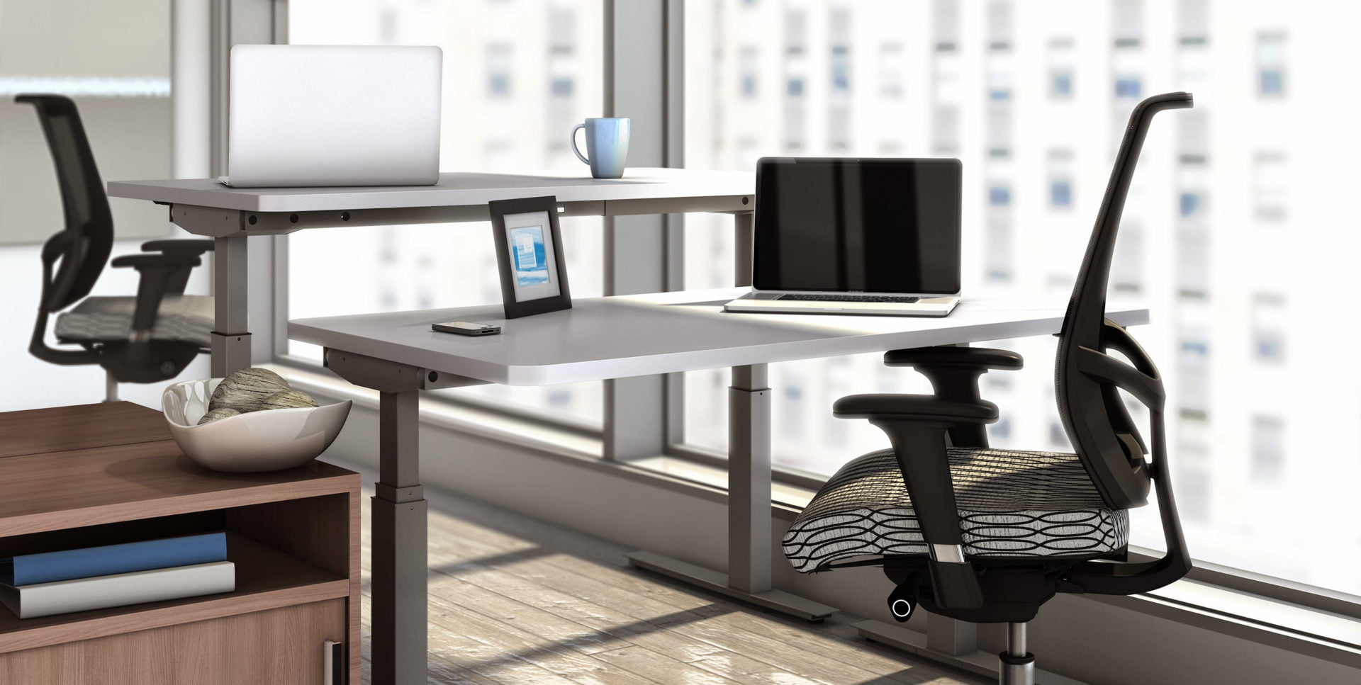 sit-stand height adjustable ergonomic desks by Mayline