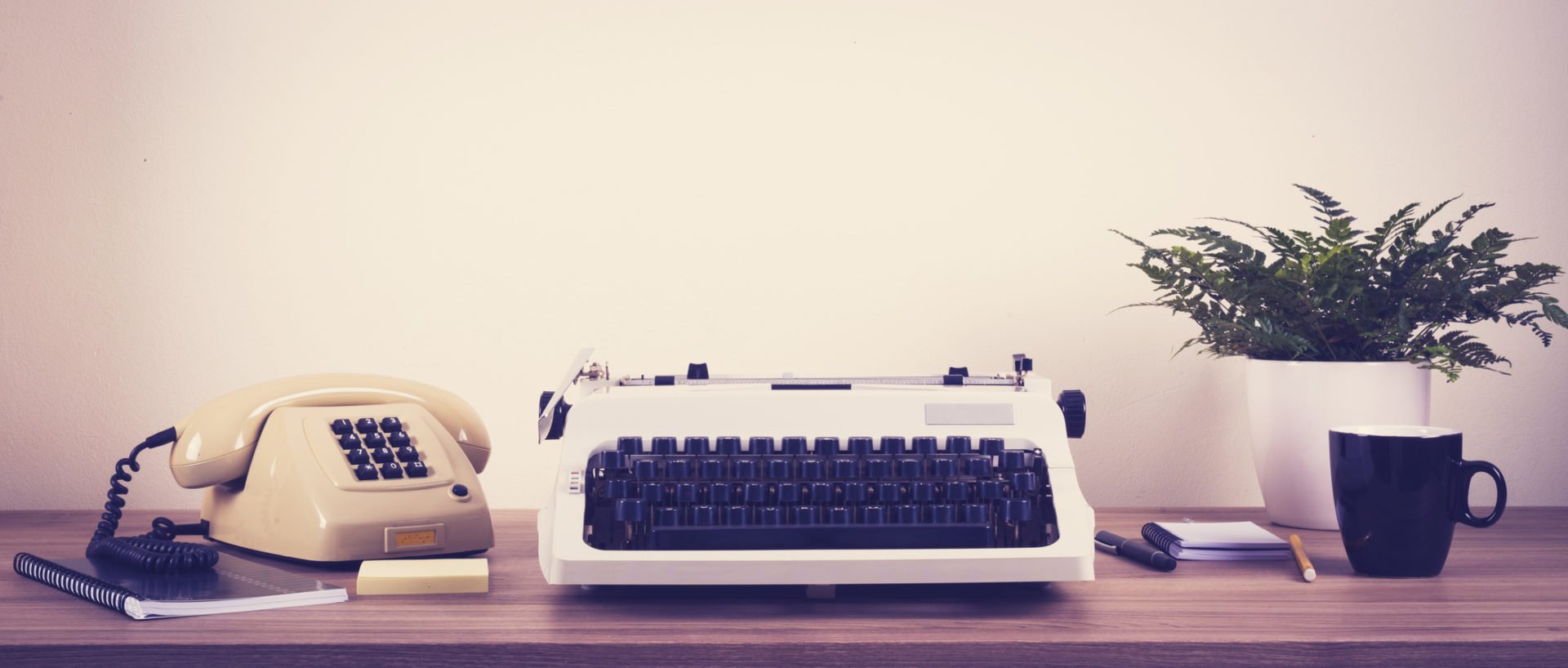 retro typewriter and phone