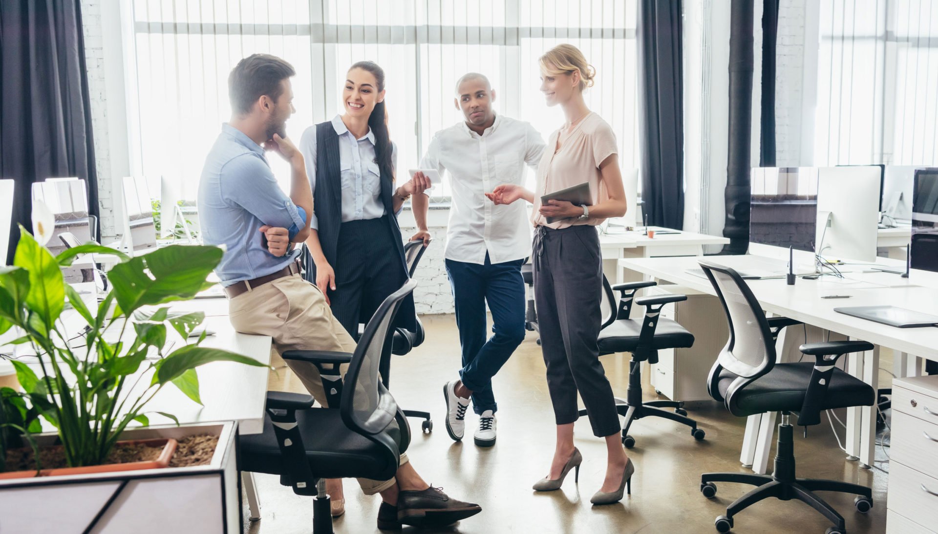 young attractive business associates in casual work attire