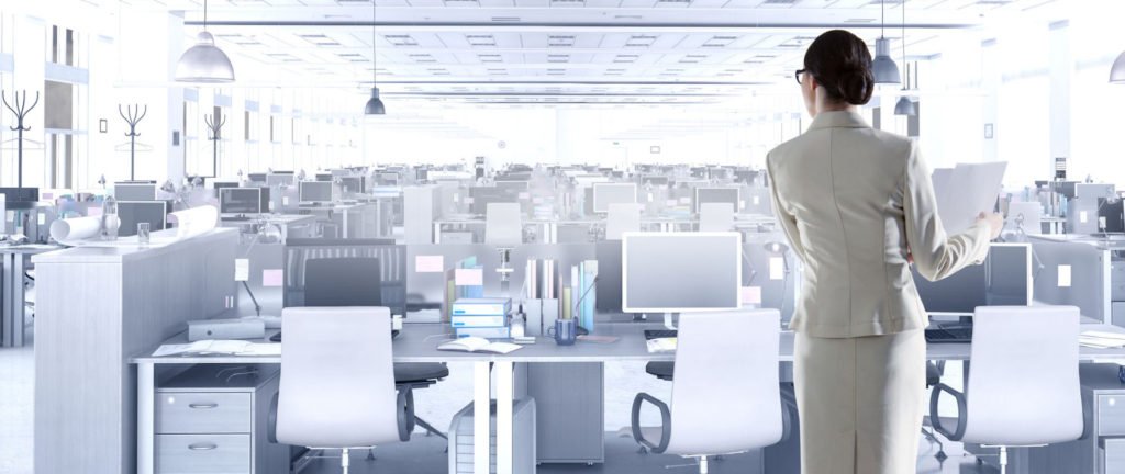 woman surveying office space planning and design