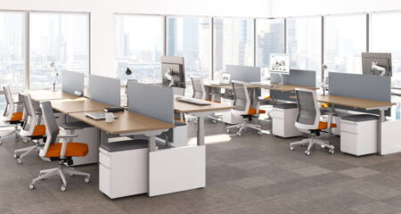 KINEX Studio Shot Showing two sets of double run workspaces. Daylight shines through the windows, onto these platinum metal and walnut laminate.