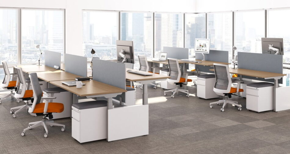 KINEX Studio Shot Showing two sets of double run workspaces. Daylight shines through the windows, onto these platinum metal and walnut laminate.