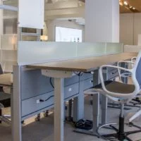 Evolve Power Beam Workstations with Middle Credenzas, Glasstop Dividers with Laminate - EPB513