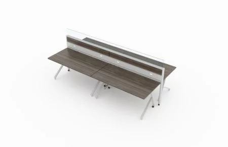 4-Person group work area, using Junction tables. The front raceway is given acajou panels which match the tabletop. The privacy wall is topped with a glass panel. It is placed on a white background. Model is EPB525.