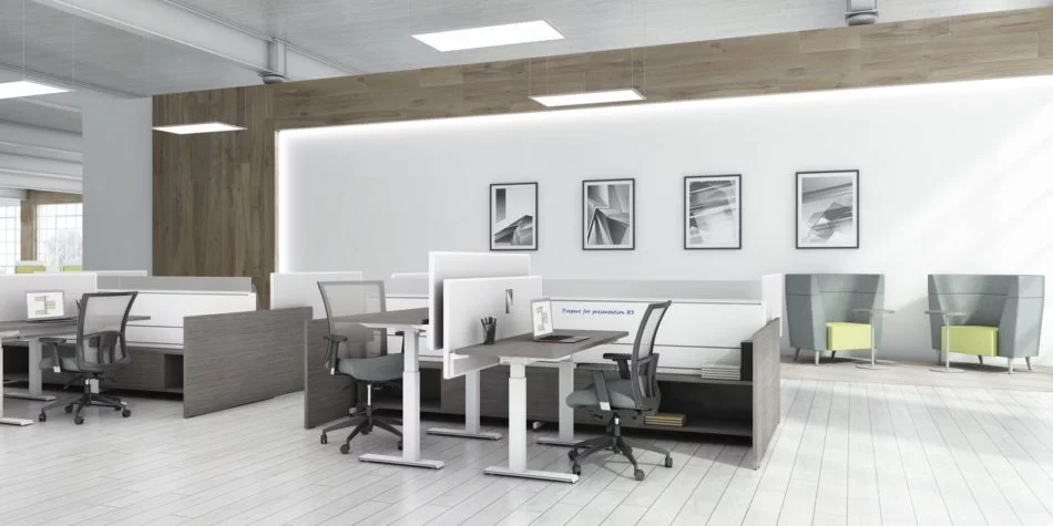Two sets of Global's 4-person power beam desks.Each workstation has a laptop open. To the user's right are credenzas with Acoujou paneling