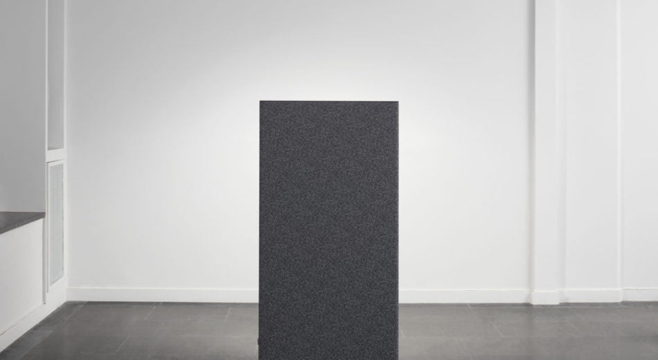 Studio shot of a single dB privacy panel, in a dark grey.