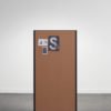 Studio shot of a single dB privacy panel. A set of notes and cards are pinned at the top.