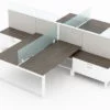 4-Person set of L-shaped workstations. Frameless Clear acrylic pieces make up the top of the partition, on one side of each workstation. Just below the main partition is a wide credenza, just under the work surface. At its side is a ledge for storing bags and purses. This is rendered on a white background. Model is EV507.