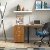 Studio shot of OTG's Home Office Setup, which has a 24" x 48" work table placed in the corner by the window. At the left is a set of pedestal drawers. The third (top) drawer has a lock on it. Both the desk and pedestal drawers are finished in an Autumn Walnut. A simple mesh-back office chair is pulled up to the laptop, with a LED lamp next to it.