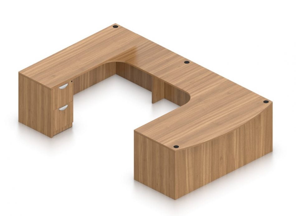 Orthographic view of an Offices to Go set of desking, using Layout B. This set consists of a 71" wide desk, with a curved bow front. A matching width credenza is arranged just across, with a 36" wide flush bridge spanning in between. At the outside of this layout is a set of pedestal drawers, with the second (top) drawer sporting a lock. This desking set is shown in an Autumn Walnut finish.