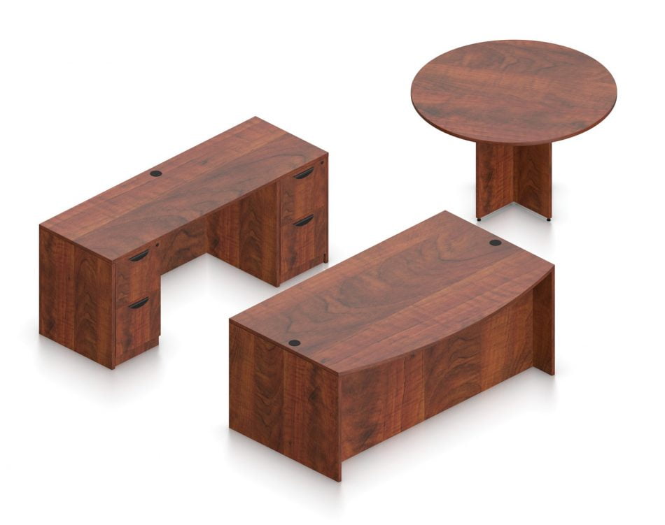 Orthographic view of an Offices to Go set of desks and tables, using Layout G. This set consists of a 71" bowed front style desk and a 48" round table to the side. A pair of file drawers are at each side, within a credenza at the back. This set is shown with the American Dark Cherry laminate finish.