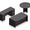 Orthographic view of an Offices to Go set of desks and tables, using Layout G. This set consists of a 71" bowed front style desk and a 48" round table to the side. A pair of file drawers are at each side, within a credenza at the back. This set is shown with the American Espresso laminate finish.
