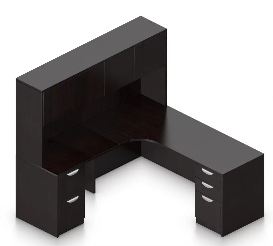 Orthographic view of an Offices to Go set of desking, using Layout L. This set consists of a 71" corner desk, with matching hutch stacked at the left corner extension. The hutch has two cabinets, each with double doors. In the desk, at each side, is a set of pedestal drawers. The extension side features two equal height drawers, and the other side features a set of three drawers. Each one has a lock at the top. This desking uses an American Espresso laminate finish.