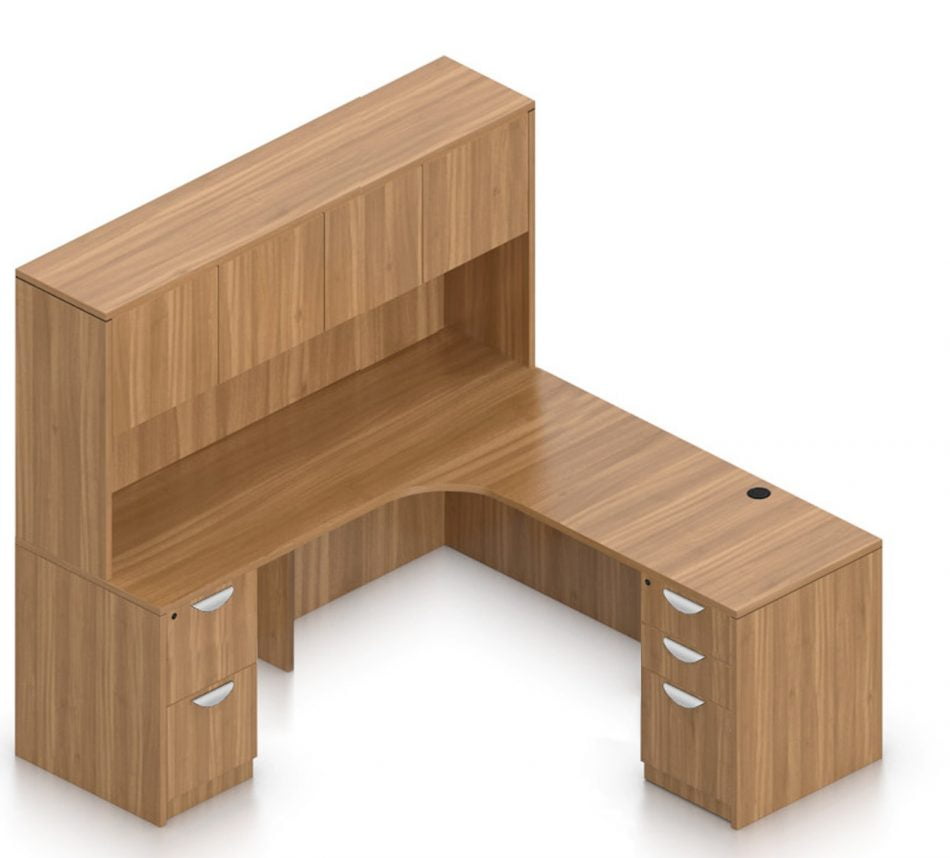 Orthographic view of an Offices to Go set of desking, using Layout L. This set consists of a 71" corner desk, with matching hutch stacked at the left corner extension. The hutch has two cabinets, each with double doors. In the desk, at each side, is a set of pedestal drawers. The extension side features two equal height drawers, and the other side features a set of three drawers. Each one has a lock at the top. This desking uses a Autumn Walnut laminate finish.