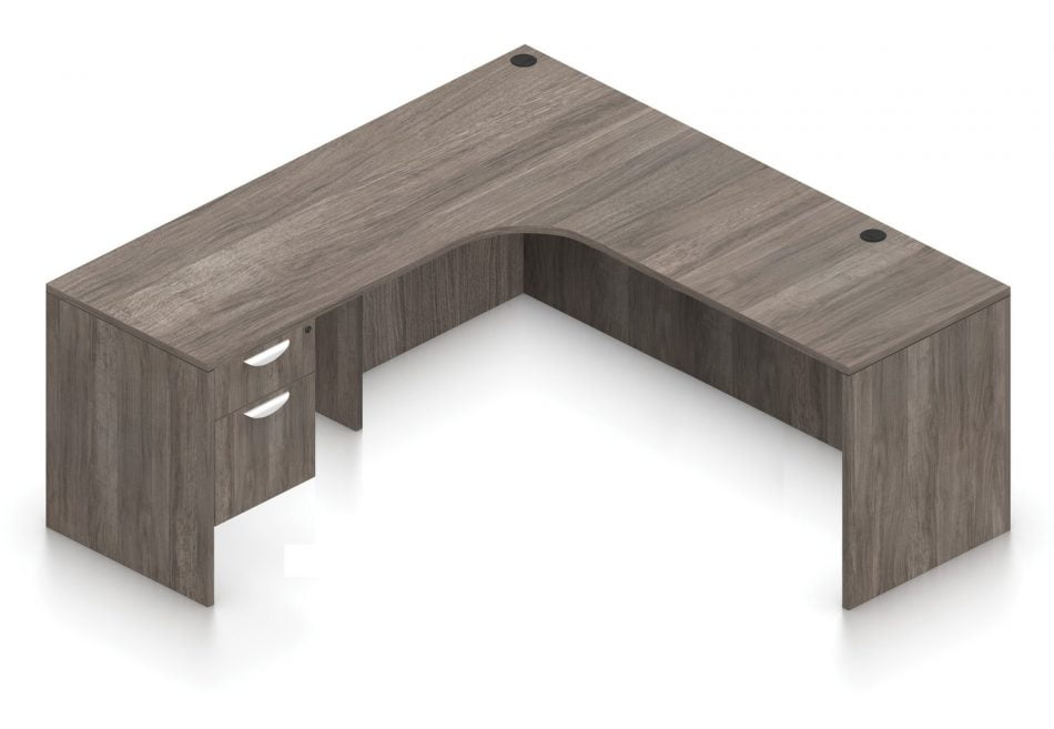 Orthographic view of an Offices to Go 71" corner desk with right side extension. Its inner edge is curved, and it has a set of two hanging office drawers to the left of it, with a lock on the top. This layout is featured in an Artisan Grey finish.