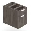 Orthographic view of an Offices to Go 22 inch deep pedestal set of drawers. The unit consists of two drawers, with the bottom most drawer serving as hanging box storage. It uses an Artisan Grey laminate finish, and features a top locking drawer.
