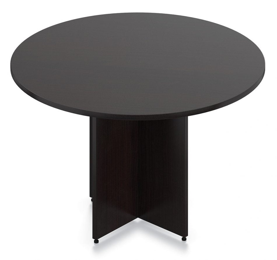 Orthographic view of an Offices to Go 48 inch round table. It is held up by a two thick wooden slats that intersect each other. The table is finished in an American Espresso laminate.
