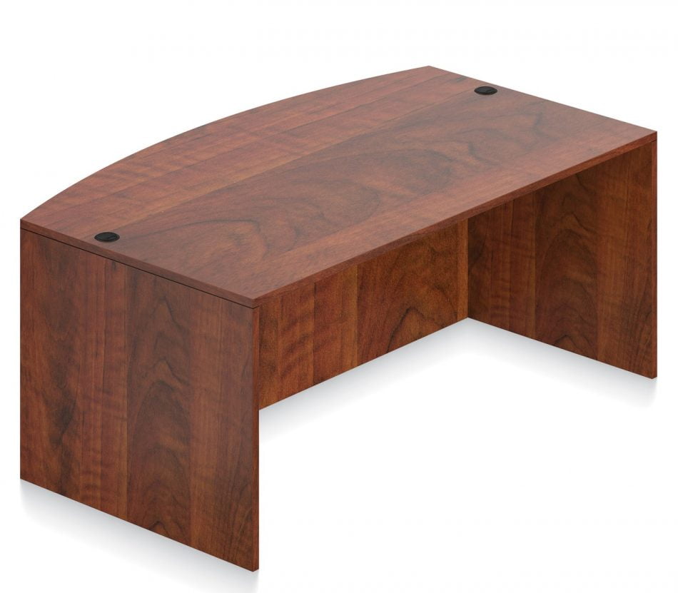 Orthographic view of an Offices to Go bow front desk module. This image shows the product in an American Dark Cherry laminate finish.