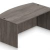 Orthographic view of an Offices to Go bow front desk module. This image shows the product in an Artisan Grey laminate finish.