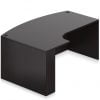 Orthographic view of an Offices to Go bow front desk. It has a short extension, curving ninety degree at your left. It has an American Espresso laminate finish.