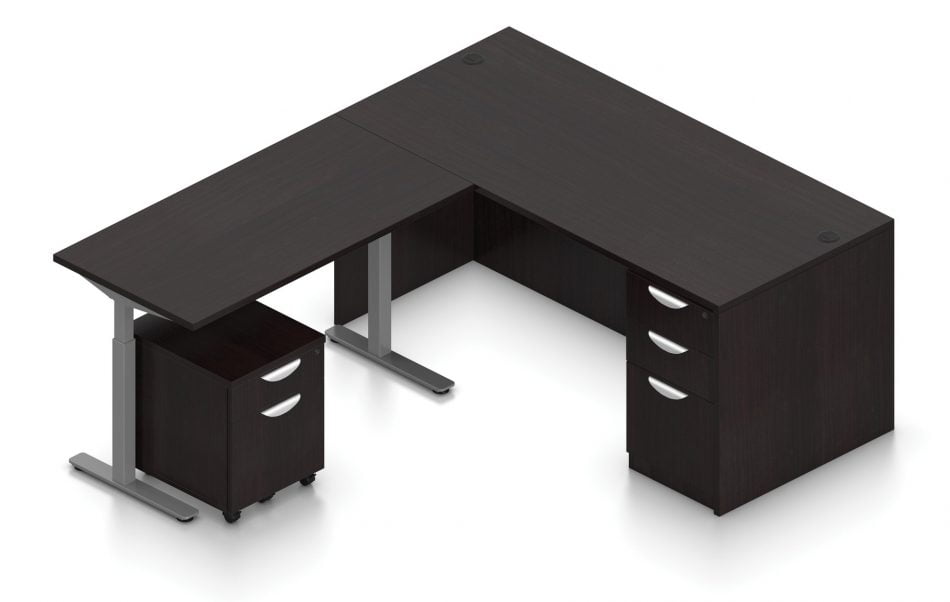 Orthographic view of an Offices to Go corner desk set, using Layout 7. A 66" wide desk and 48" table are arranged in an L-shape, the height adjustable table set level with the desk. A set of three file and drawers are set into the right side, with an additional set of pedestal drawers rolled underneath the table (at the other side). This layout is featured in an American Espresso finish.