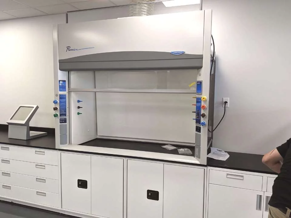clean new laboratory with white finishes and fume hood