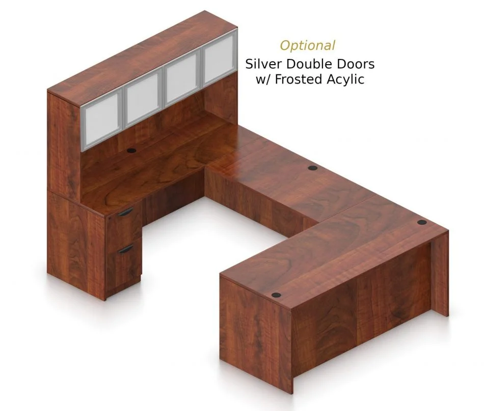 Orthographic view of an Offices to Go set of desking, using Layout B. This set consists of a 71" desk and a matching width credenza, with a 48" bridge spanning in between. A 71" Hutch rests atop the one side, and it is shown with the optional upgrade of silver double doors. There are a set of two drawers on the credenza below. Layout B is shown here in an American Dark Cherry finish.