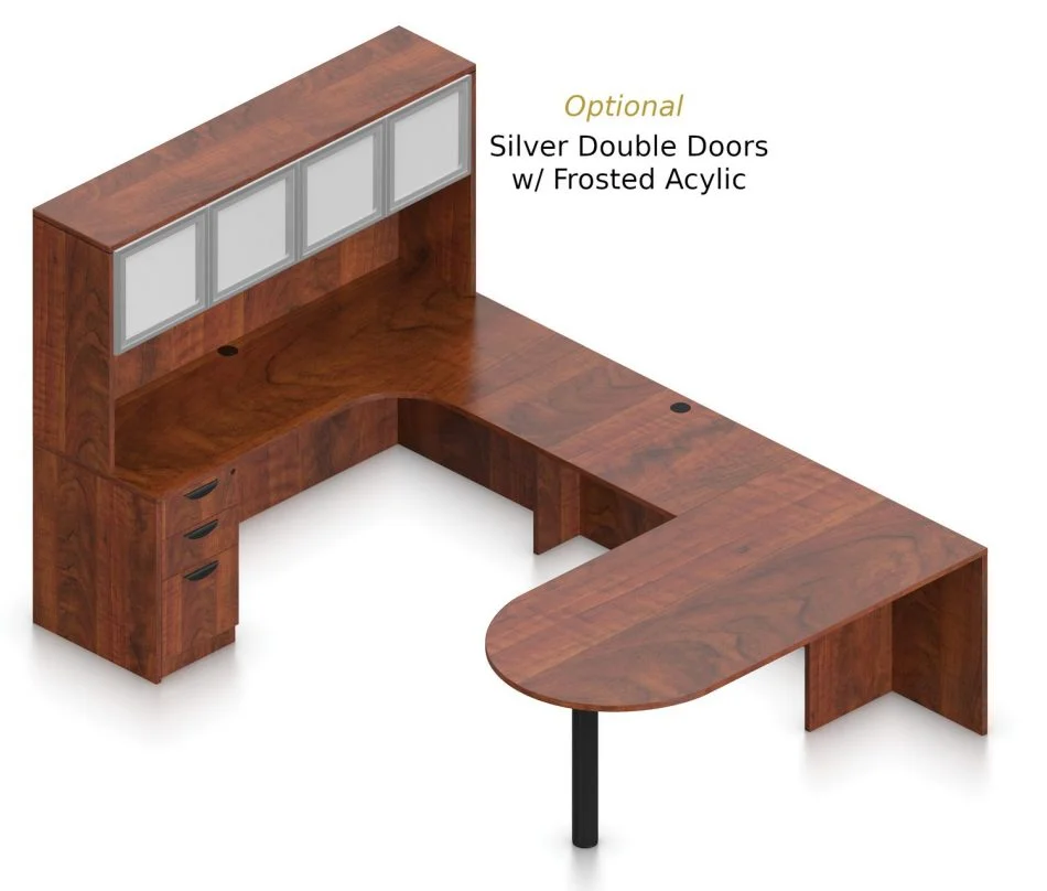 OTG Superior Laminates Layout F w Optional Silver Doors - American Dark Cherry Finish Orthographic view of an Offices to Go set of desking, using Layout F. This set consists of a 71" D-shape, held up by a thick post. On the opposite side is a matching 71" Credenza with corner extension. Atop the credenza, the view shows the optional silver and frosted acrylic doors. A 42 inch extension bridges between the two. On the hutch side is a set of three pedestal drawers, with a lock upon the top. Layout _ is shown here in an American Dark Cherry finish.