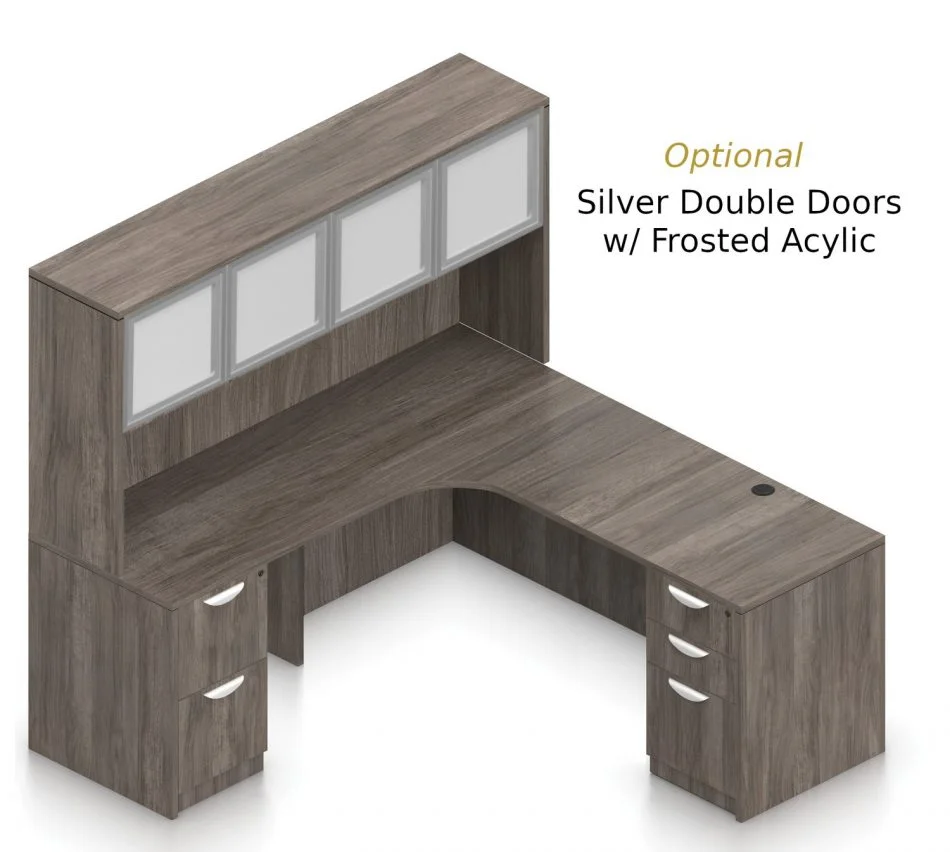 Orthographic view of an Offices to Go set of desking, using Layout L. This set consists of a 71" corner desk, with matching hutch stacked at the left corner extension. The hutch has two cabinets, shown with optional silver frame and frosted acrylic double doors. Within the desk, at each side, is a set of pedestal drawers. The extension side features two equal height drawers, and the other side features a set of three drawers. Each one has a lock at the top. This desking uses an Artisan Grey laminate finish.