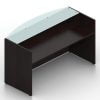 Orthographic view of an Offices-to-Go 71 inch desk shell for the receptionist desk. It has a frosted acrylic ledge with a curved outer edge, with a full width shelf just underneath. This furniture uses an American Mahogany laminate finish.