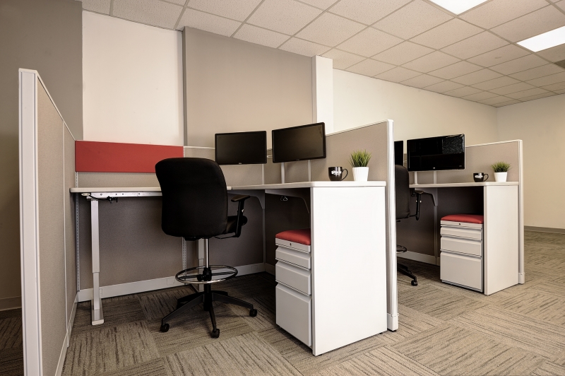 Raised cubicle with drafting chair