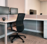 low_walled cubicle with global loover chair