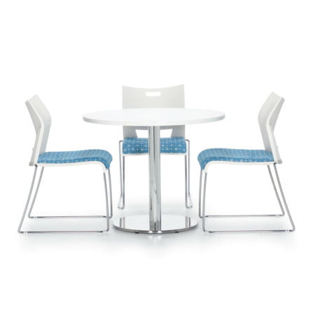 white cafe table with modern blue and white metal chairs