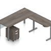 Orthographic view of an Offices to Go desk and table set, using Layout 4. This L-shaped desking consists of a 71" wide metal table with a 48" height adjustable table attached at a 90 degree angle. A rolling file pedestal is under the table, consisting of 2 drawers with a top lock. An acrylic privacy panel is mounted at the front of (underneath) the table. This layout is shown with the Artisan Grey laminate finish.